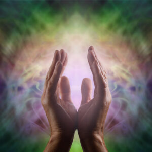 an image of hand raising above spiritually